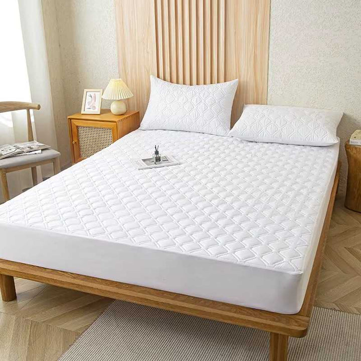 Protector Antifluido Premium + Fundas de Almohada GRATIS