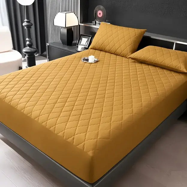 Protector Antifluido Premium + Fundas de Almohada GRATIS