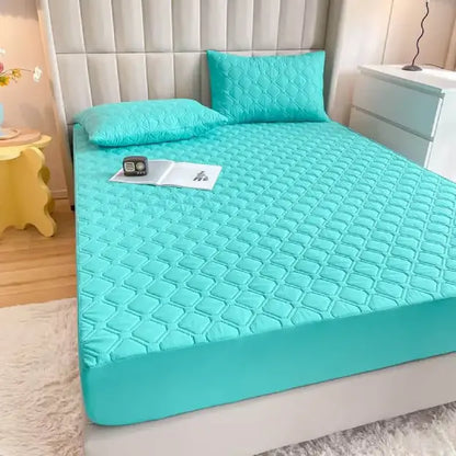 Protector Antifluido Premium + Fundas de Almohada GRATIS